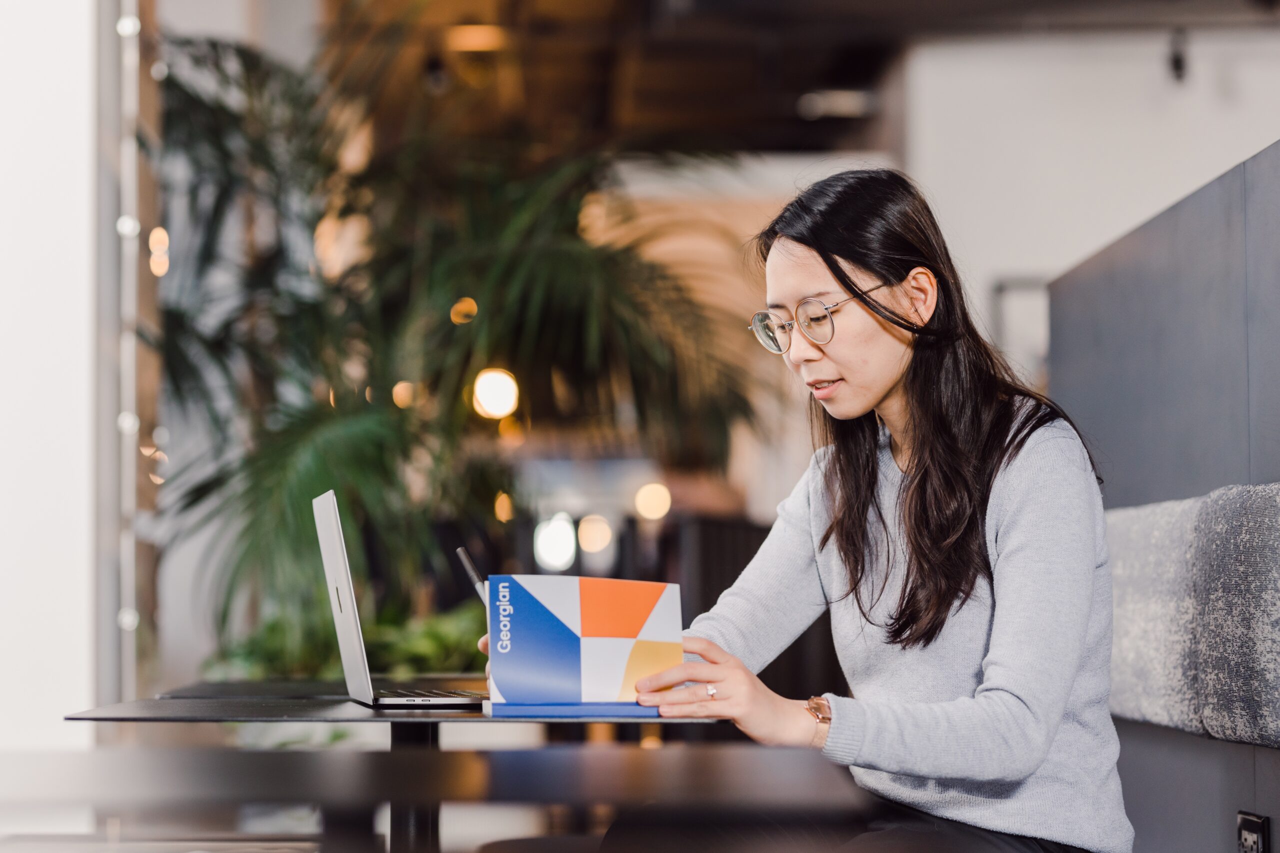 Person writing in a notebook