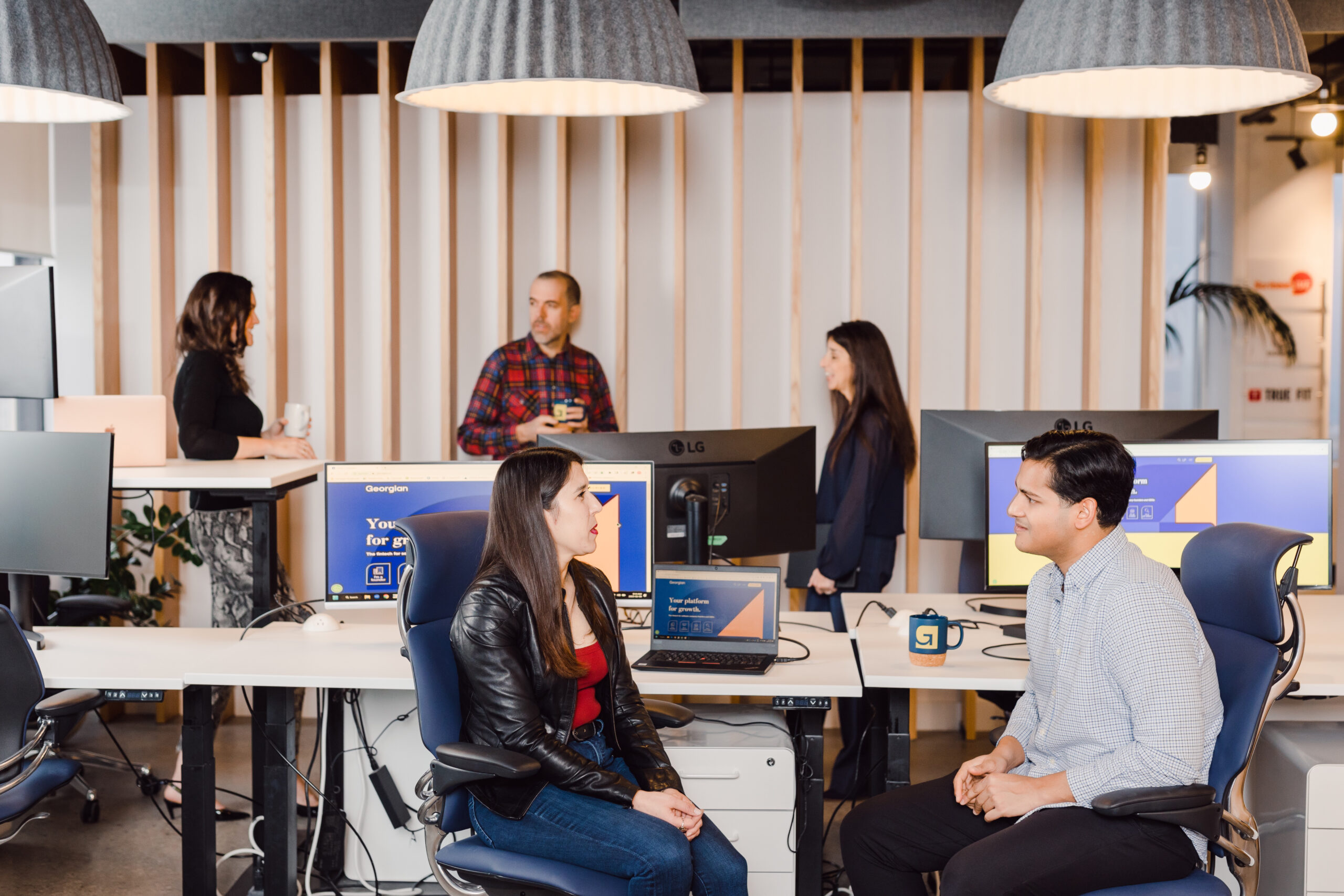 Employees are engaging on conversations at their work space