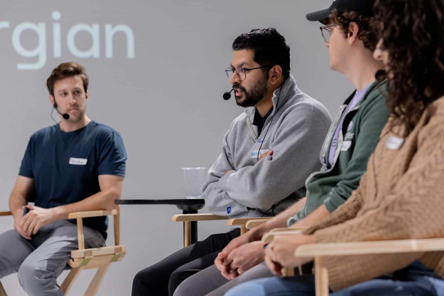 Nahim Nasser Georgian Caption: Nahim Nasser (center) speaking on a panel at an event October 2025. Photo credit: Qasim Virjee, Startwell Studios